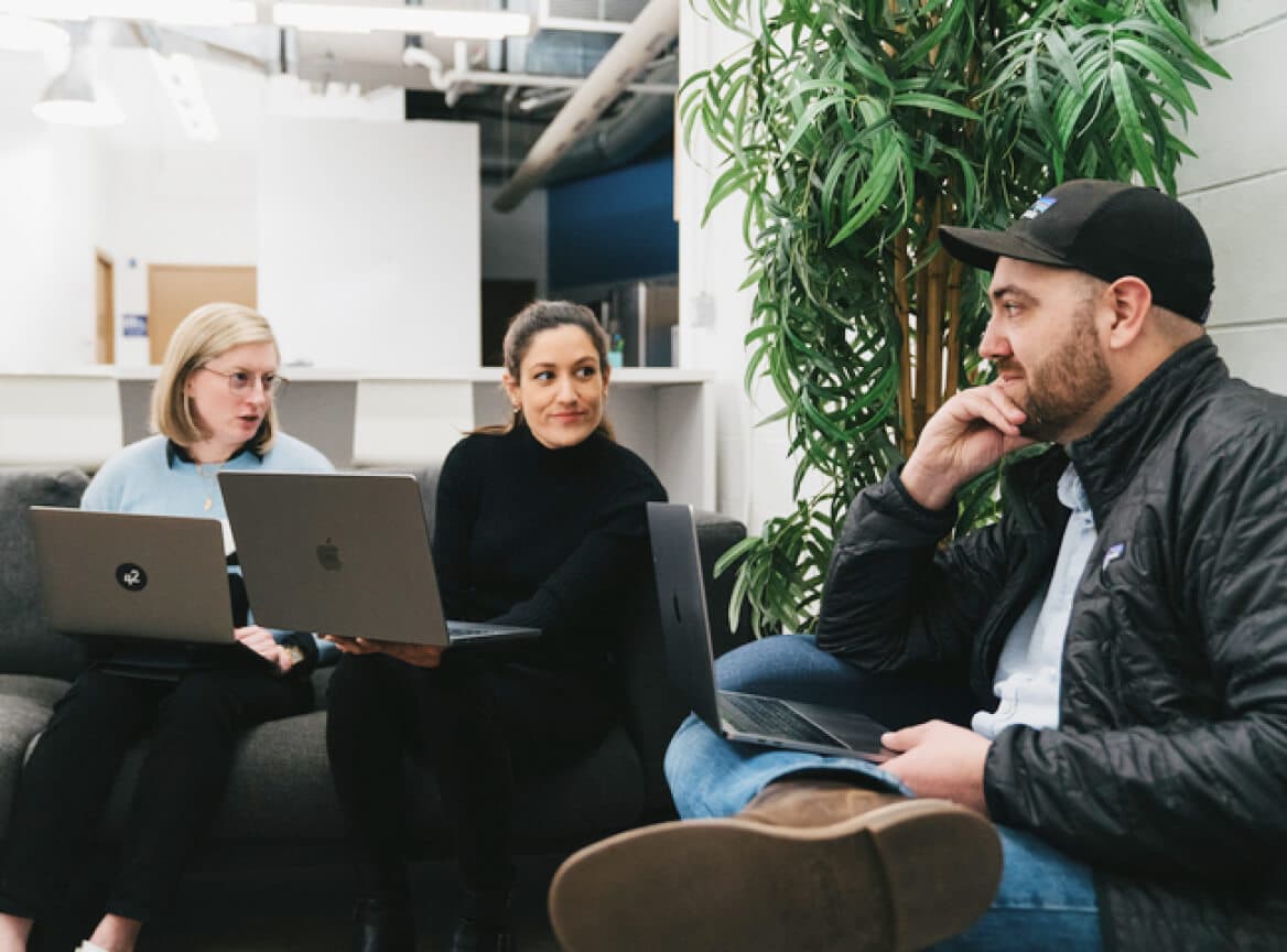 42 team members working together in the office